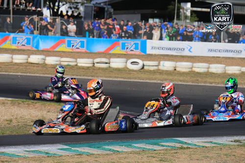 Kiwi karter Ryan Grant (#64) in the thick of the action in a KZ2 heat race at Puckapunyal