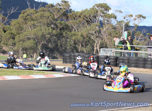 Tate Frost leads the Lights in KA4 Junior as Jesse Sheals (27) and Heavy winner Connor Griffin make contact back in the pack