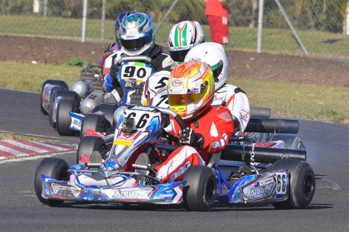 Reigning New Zealand Junior Restricted 100cc Yamaha class champion Caleb Cross (#66) fighting for position in one of the Junior National Light races at the Queensland State Titles on Sunday
