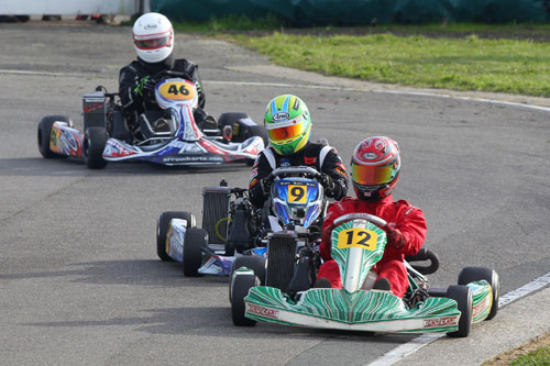 He may have finished 2nd in KZ2, but Chris Cox (#12) won 125cc Rotax Max Light, here leading Manson (#9) and Nelson's Liam Lotter (#46).