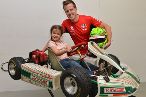 V8 Supercars Champion James Courtney (pictured with his five year-old daughter Zara) fully supports the KIDS Education Program 