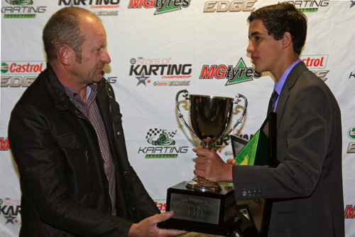Jayden Ojeda accepting the Jon Targett Perpetual Trophy from Jon Targett 