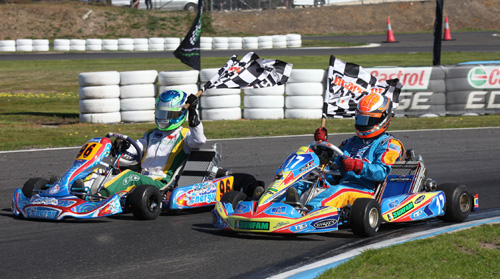 KF2 Round Winner Liam McLellan (#96) and Champion Troy Loeskow on their victory lap