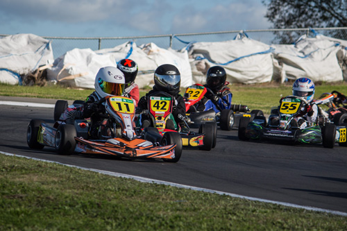 Seven-year-old Louis Sharp (#11) on his way to both a round and series class win in one of the Cadet ROK heats