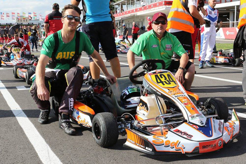Lee with mechanic Paul Gallo and the winning kart on the grid before the final 