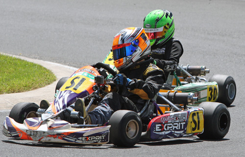 Vortex Mini ROK class points leader William Exton (#SI) and title rival Jackson Rooney (#30)