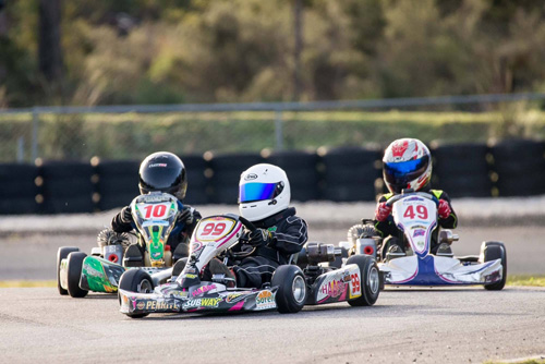 #99 Darcy Whelan leads #10 Ollie Richardson and #49 Toby Callow in Cadet 9