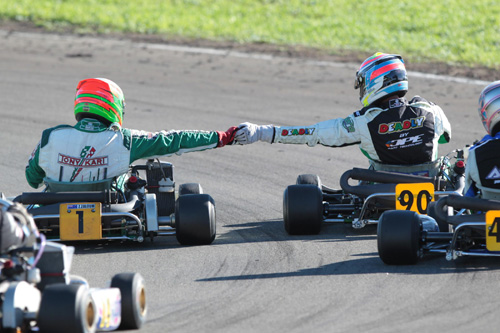 Ryan Urban (#90) being congratulated by the driver who he took the 125cc Rotax Max Heavy title off, Zach Zaloum (#1)