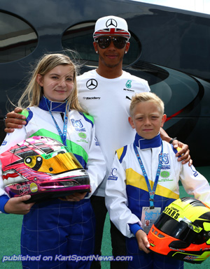Lewis Hamilton with two of the 2015 FKS competitors, Bryony King and Caden McQueen